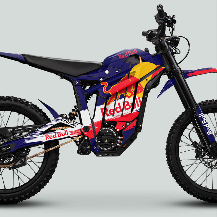 Talaria Sting MX5 PRO Graphics Kit features Red Bull livery on an electric dirt bike, showcasing durable decals, knobby tires, and sleek design enhancements.
