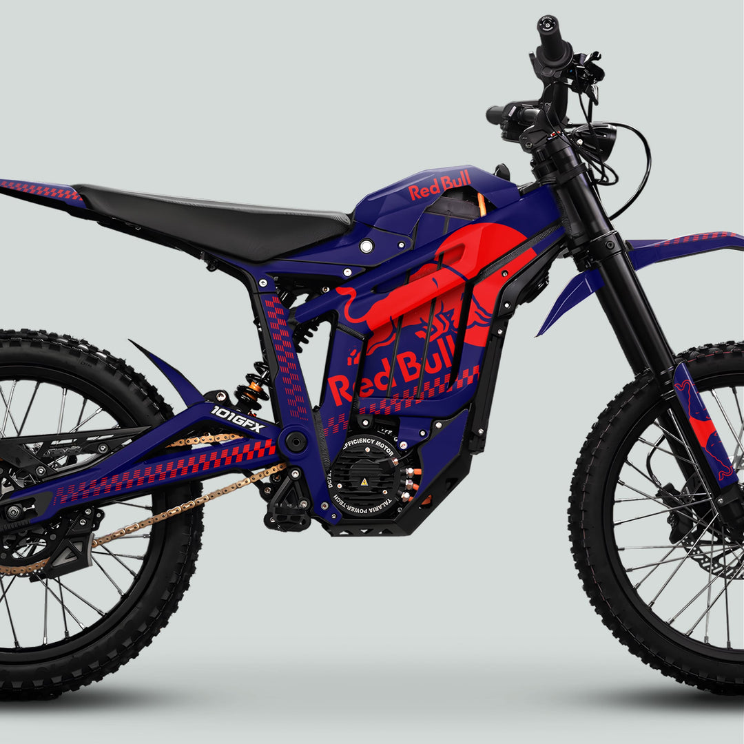 Talaria Sting MX5 PRO Graphics Kit RBULL MONO Navy Red Decals on an electric off-road bike, featuring high-clearance frame, robust suspension, and Red Bull branding.