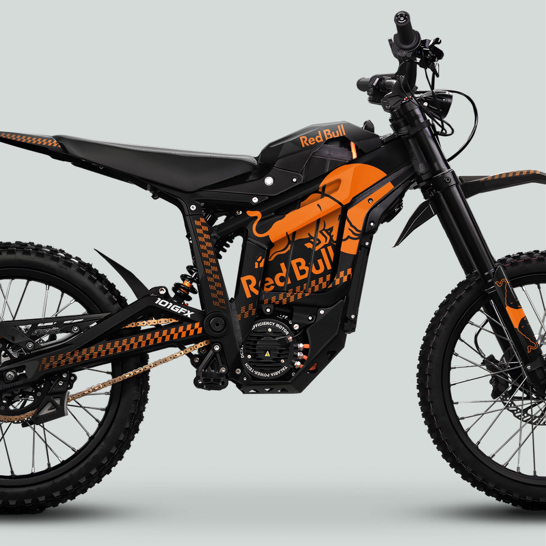 Talaria Sting MX5 PRO Graphics Kit RBULL MONO Black Orange Decals on a Red Bull electric dirt bike, showcasing sleek design and durable materials for standout style.