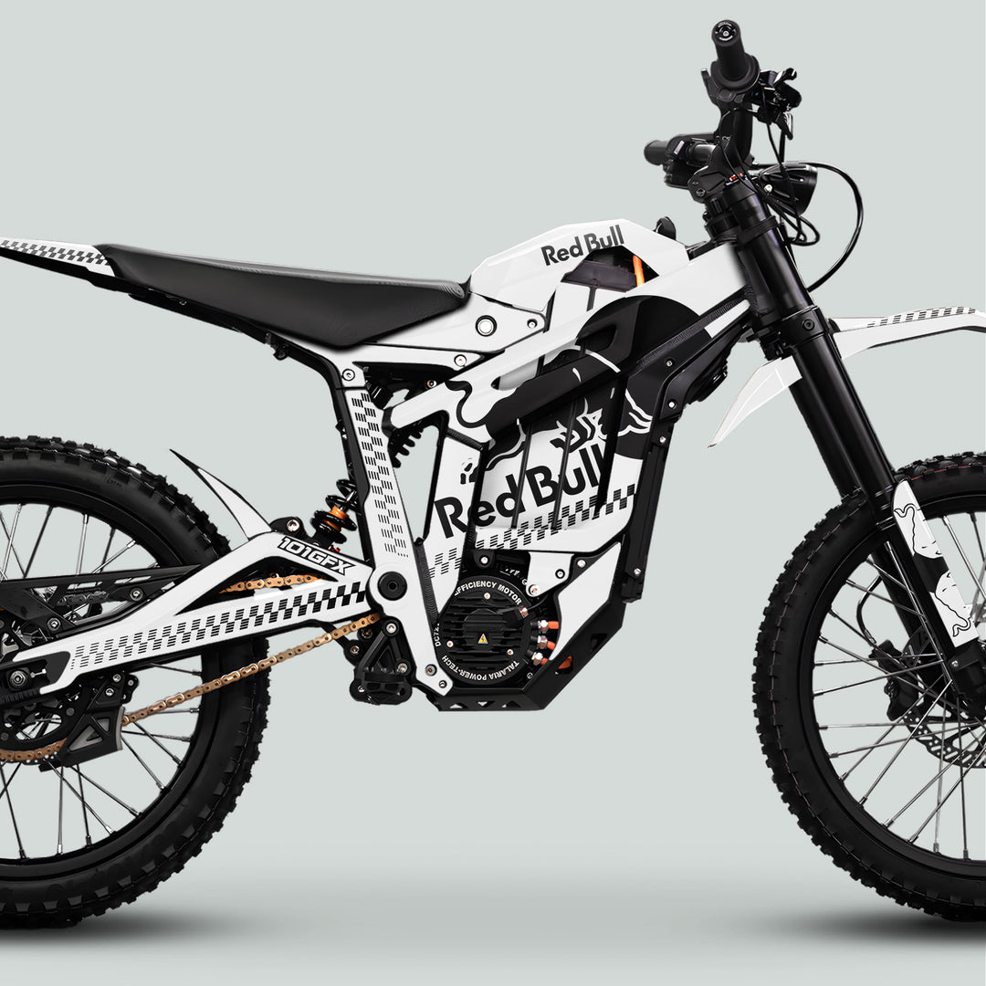 Talaria Sting MX5 PRO Graphics Kit RBULL MONO features a sleek Red Bull-branded electric dirt bike with knobby tires, long-travel suspension, and a glossy, stylish decal finish.