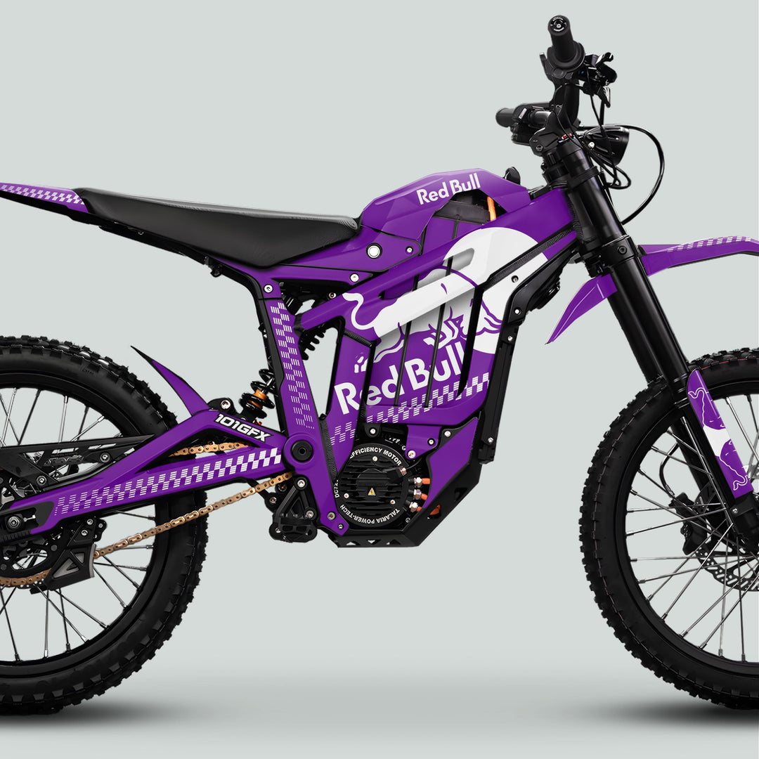 Talaria Sting MX5 PRO Graphics Kit RBULL MONO, featuring Red Bull livery on a purple dirt bike with knobby tires, electric motor, and distinctive decals.