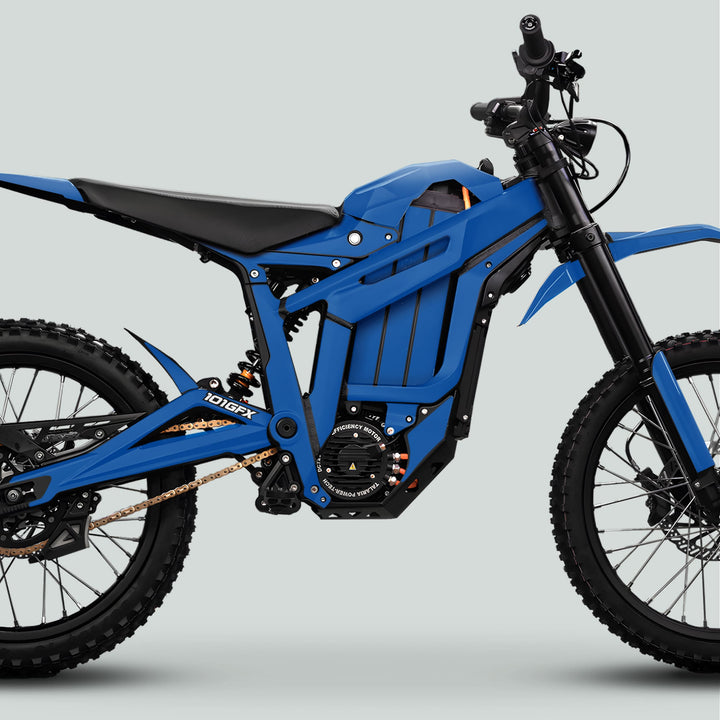 Talaria Sting MX5 PRO Graphics Kit SOLID COLOR Blue Decals on off-road electric motorcycle, showcasing tubular frame, efficient motor, off-road suspension, and rugged tires.