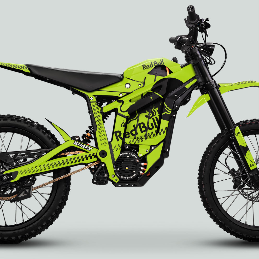 Talaria Sting MX5 PRO with high-visibility Red Bull livery, featuring a large central motor, off-road tires, and robust suspension, showcasing the RBULL MONO Green Black Decals.