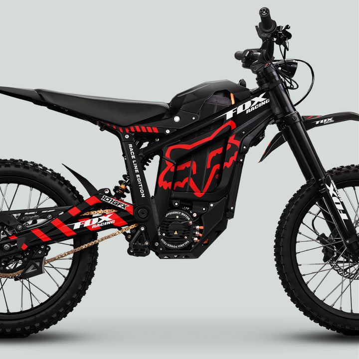 Talaria Sting MX5 PRO Graphics Kit FOX RACELINE features on an electric off-road bike, showcasing knobby tires, front suspension, motor, battery, and chain drive.