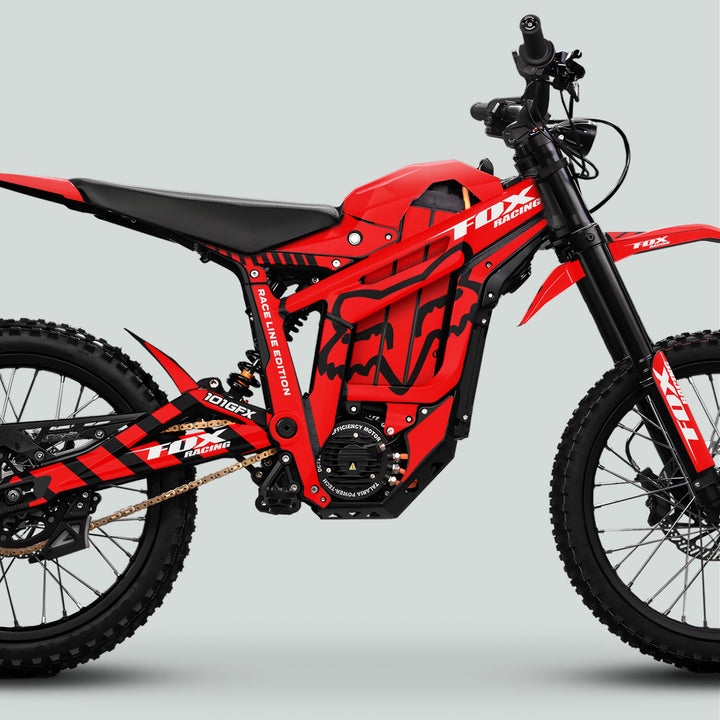 Talaria Sting MX5 PRO Graphics Kit with FOX RACELINE Red Black Decals on an electric dirt bike, featuring knobby tires and Fox Racing branding.