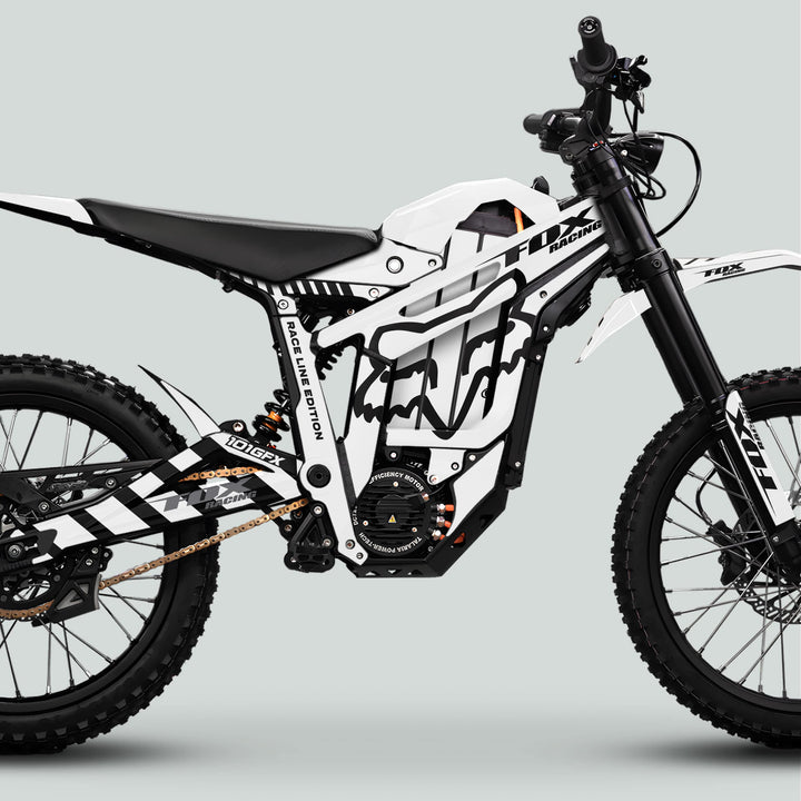 Talaria Sting MX5 PRO with FOX RACELINE White Grey Decals, featuring knobby tires, electric motor, high-travel suspension, and angular bodywork for bold off-road style.