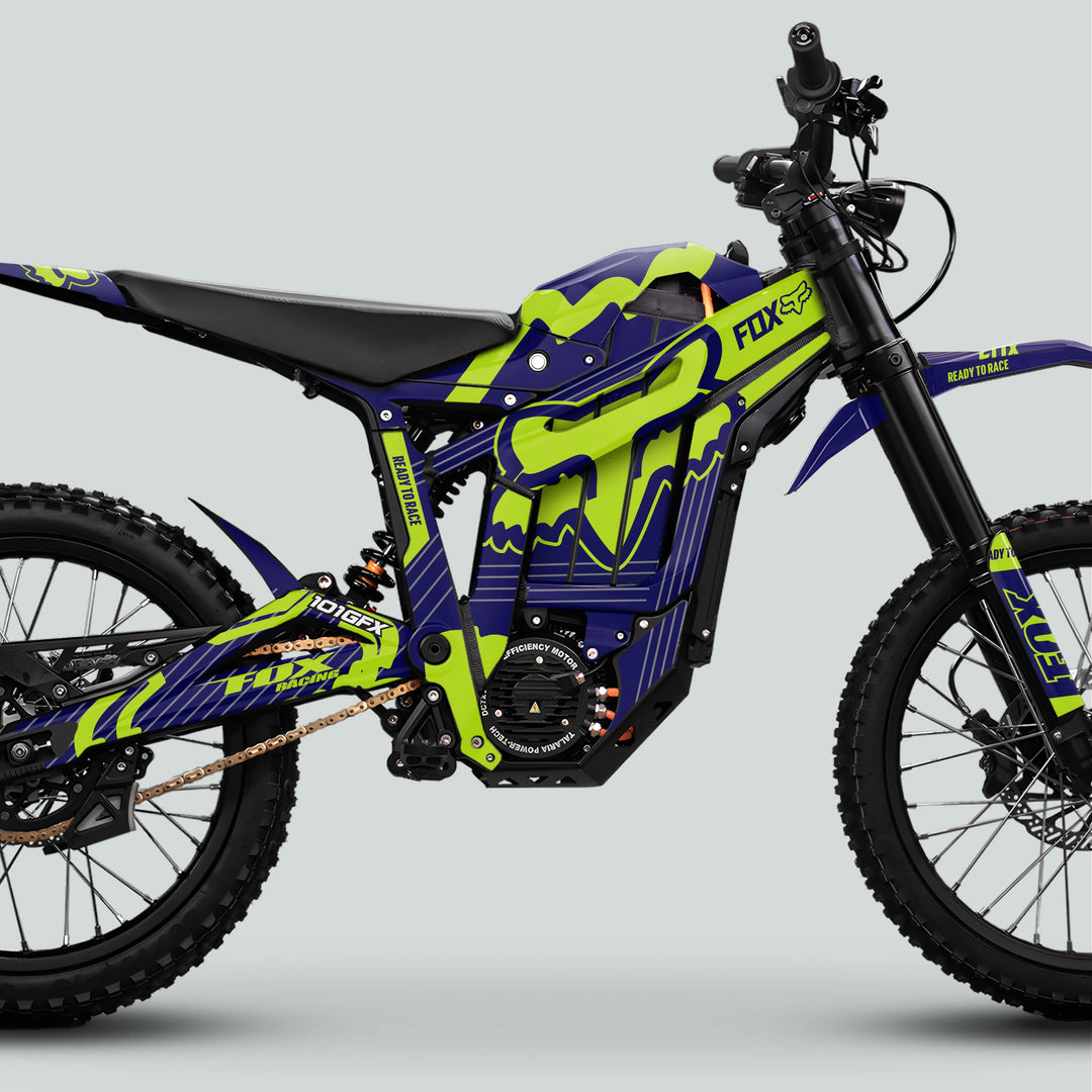 Talaria Sting MX5 PRO Graphics Kit FOX STRIPES Navy Green Decals on an electric off-road bike with rugged tires and long-travel suspension.