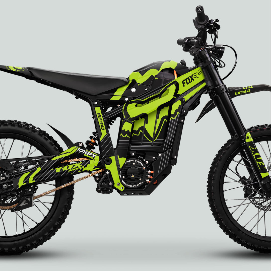 Side-profile of a Talaria Sting MX5 PRO Graphics Kit FOX STRIPES Black Green Decals on an electric dirt bike, showcasing its stylish transformation.