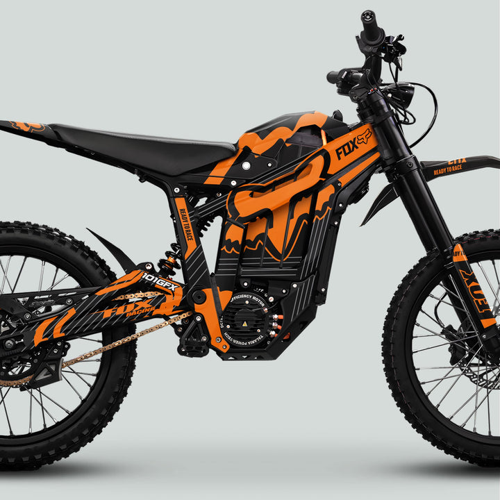 Talaria Sting MX5 PRO with FOX STRIPES Black Orange Decals, featuring full suspension, knobby tires, and visible battery, highlights unique style and durability.