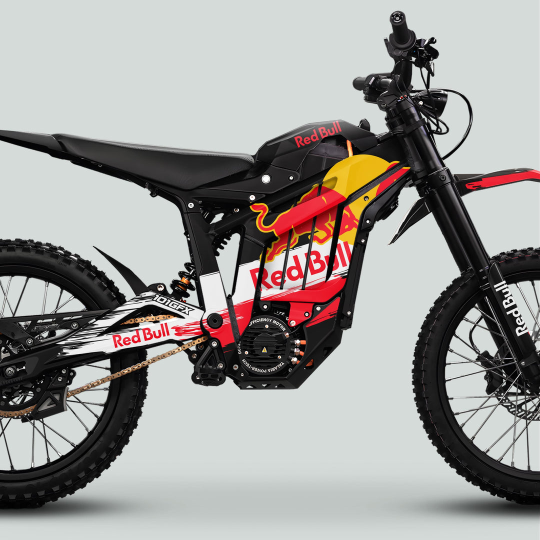 Talaria Sting MX5 PRO Graphics Kit RBULL RACE Black Decals enhances an electric dirt bike's look with bold Red Bull branding, knobby tires, and full-suspension frame.