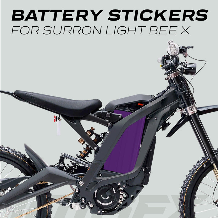 Surron Light Bee X Battery Stickers SOLID Purple shown on bike's battery, highlighting custom fit and vivid color for stylish, durable protection.
