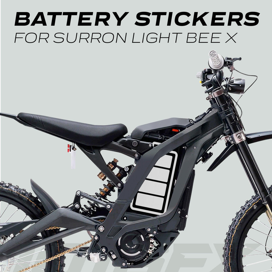 Sur-Ron Light Bee X with ICON Black White Battery Stickers featuring a charge-level graphic on the battery compartment, offering a sleek, customized look.