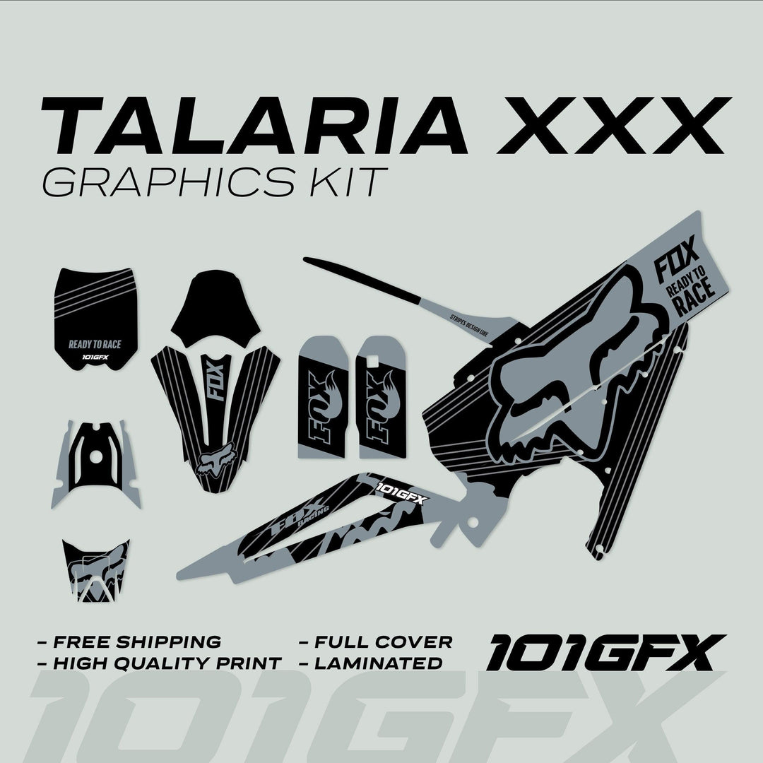 Talaria XXX Graphics Kit FOX STRIPES Black Grey laid out, showcasing fork guards, shrouds, side panels with durable, full coverage, and high-quality print features.
