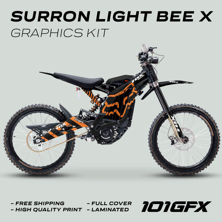 Surron Light Bee X Graphics Kit FOX RACE LINE Black Orange on bike, featuring black-and-orange vinyl wrap, FOX logo, speed-inspired stripes, promoting free shipping and durability.