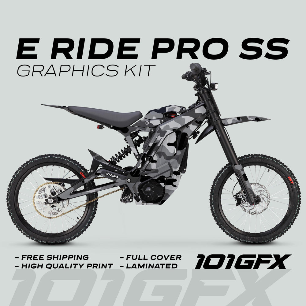 E Ride Pro SS Graphics Kit CAMOUFLAGE SNOW on an off-road motorcycle, featuring gray/black camo design with highlights on durability, easy installation, and unique style.