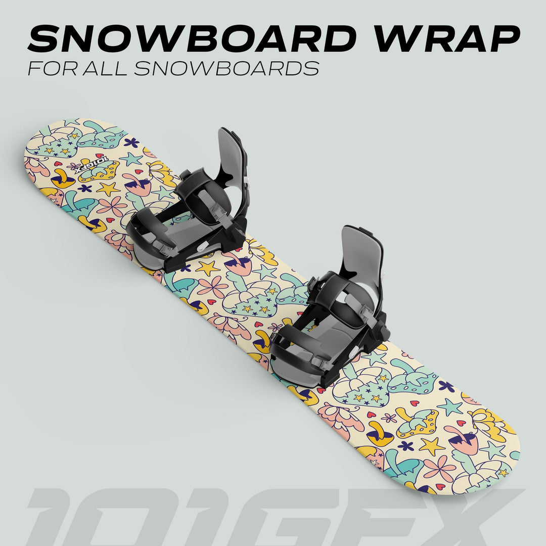 Snowboard with MAGIC MUSHROOMS wrap, featuring pastel starfish and sea creatures. Black bindings attached. Promotes style and protection for all snowboards.