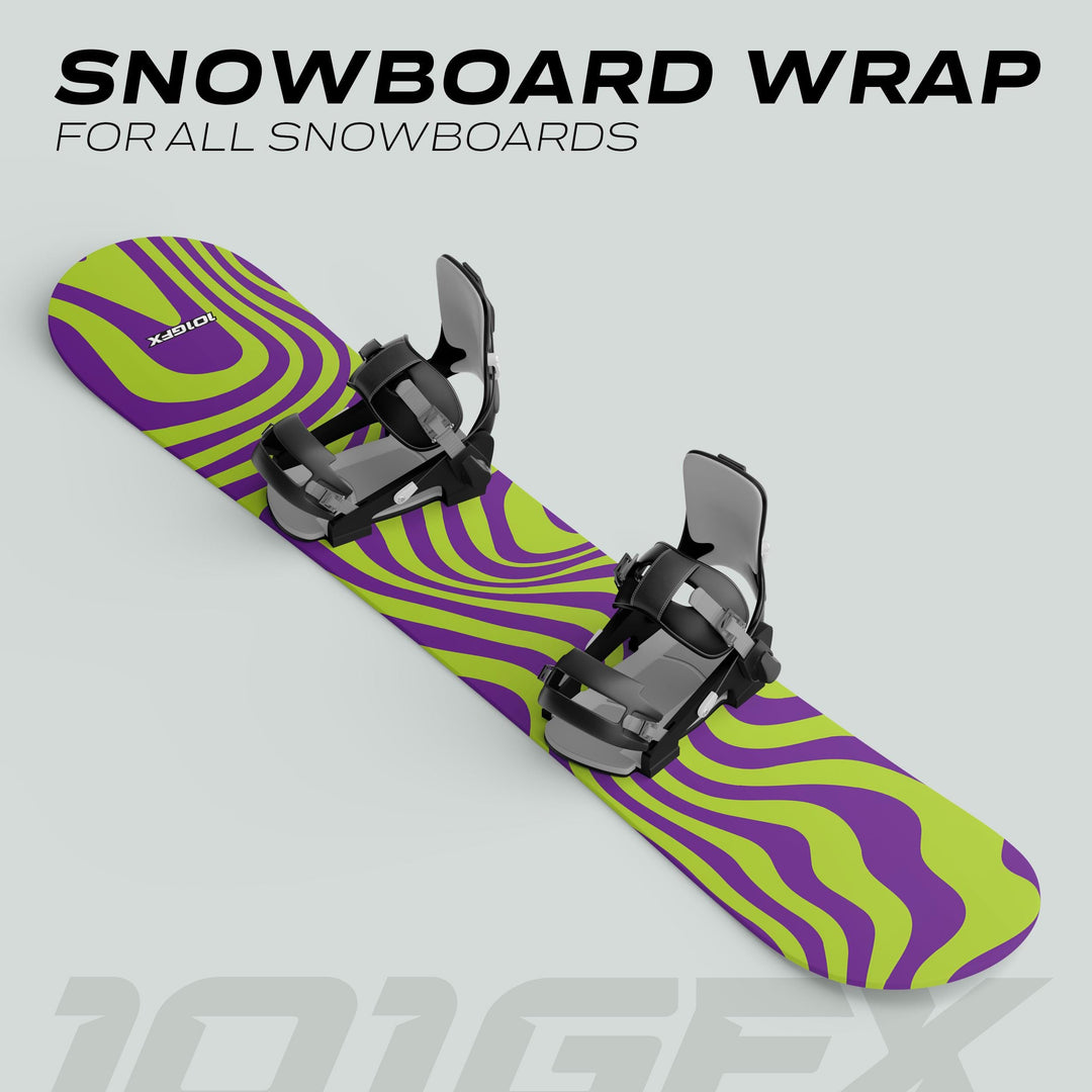 Snowboard with black bindings wrapped in Snowboard Wrap WAVY GREEN PURPLE, showcasing a bold wavy graphic design promoting customizable snowboard vinyl wraps.