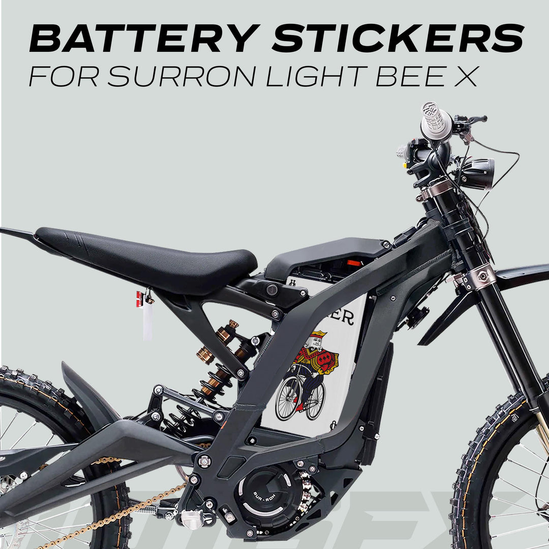 Sur-Ron Light Bee X electric dirt-bike with JOCKER battery sticker showing a playing-card character on a bicycle, enhancing aesthetics and protection.