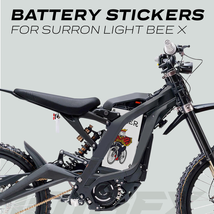 Sur-Ron Light Bee X electric dirt-bike with JOCKER battery sticker showing a playing-card character on a bicycle, enhancing aesthetics and protection.