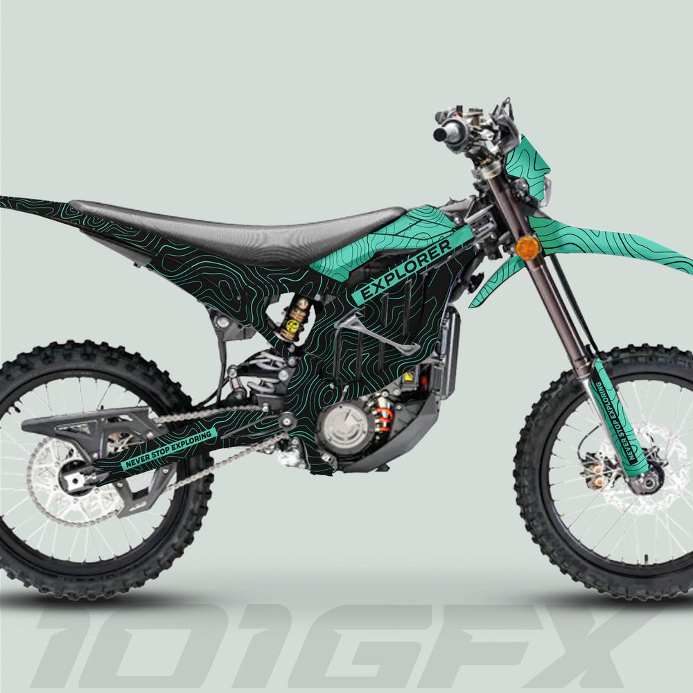 Side-view of an electric motorcycle with Surron Ultra Bee Graphics Kit EXPLORER BLACK MINT, featuring teal topographic design and NEVER STOP EXPLORING text on components.