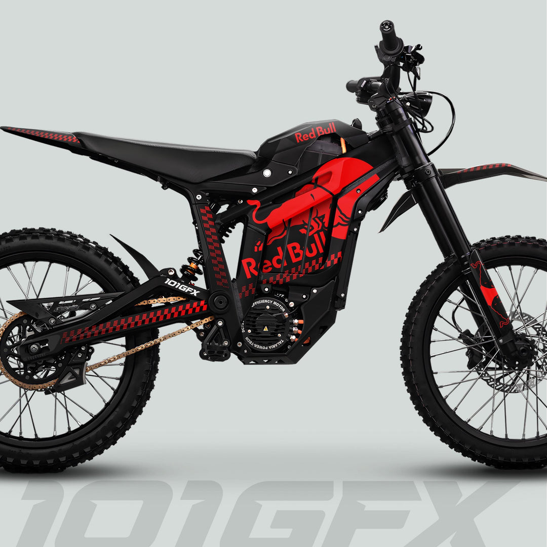 Talaria Sting MX5 PRO Graphics Kit RBULL MONO Black Red Decals on an off-road electric dirt bike with Red Bull livery and robust features.