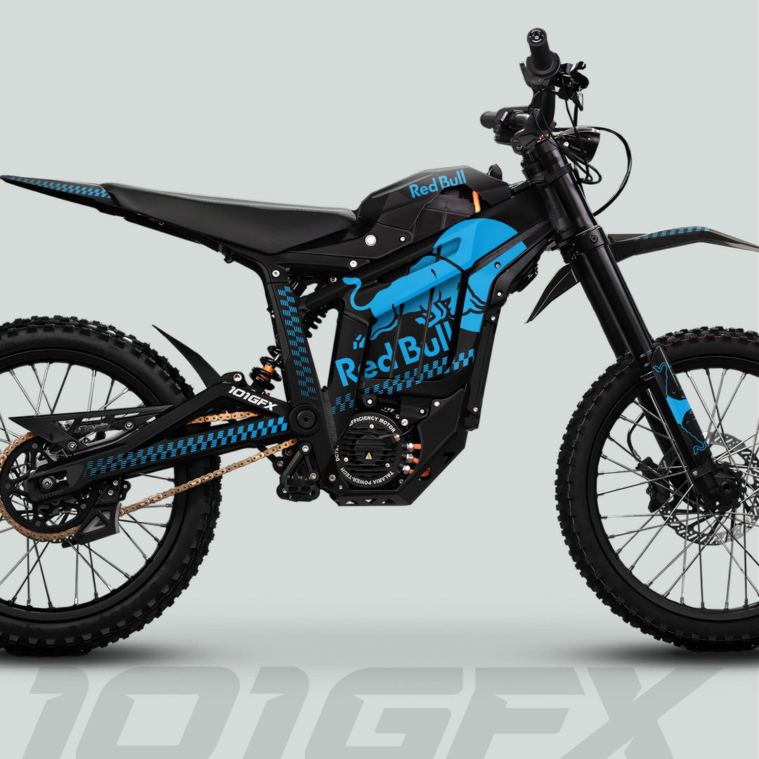 Talaria Sting MX5 PRO Graphics Kit featuring Red Bull branding on a black-blue electric dirt bike, highlighting rugged tires, suspension, and distinct decals.