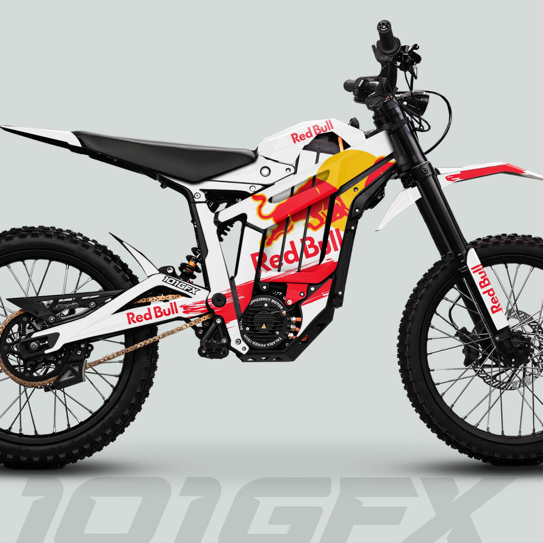 Side-view of Talaria Sting MX5 PRO Graphics Kit featuring Red Bull design, showcasing off-road features like knobby tires, suspension, and electric motor.