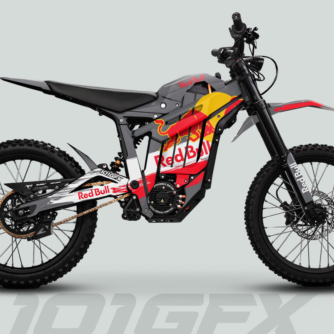 Talaria Sting MX5 PRO Graphics Kit with Red Bull livery on an electric dirt bike, highlighting high-travel forks, knobby tires, and chain drive.