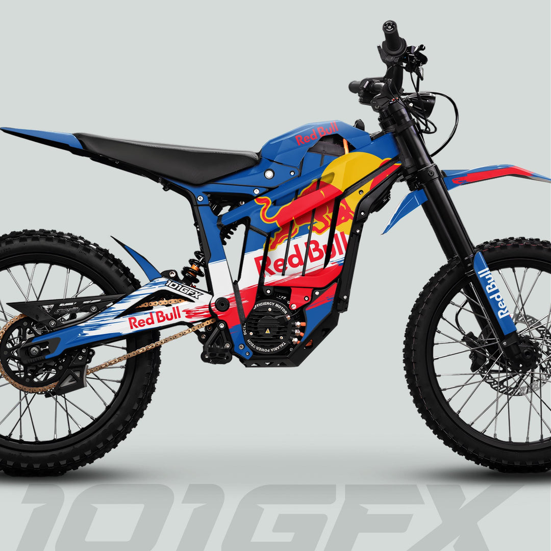 Talaria Sting MX5 PRO Graphics Kit RBULL RACE Blue Decals on electric motocross bike with Red Bull livery, highlighting suspension, battery, and knobby wheels for off-road performance.