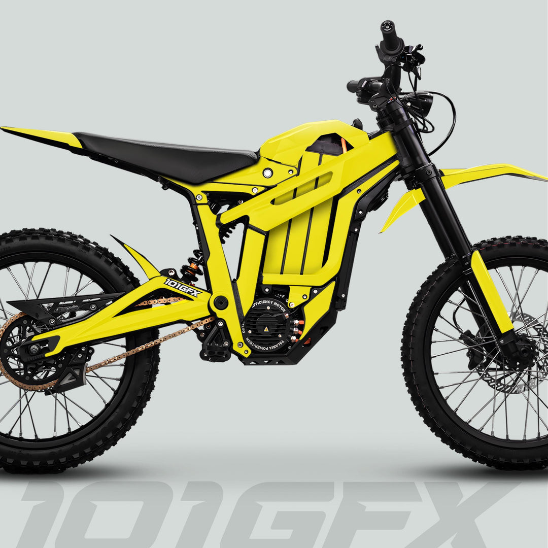 Yellow Talaria Sting MX5 PRO electric dirt bike featuring REDBULL RACE graphics, showcasing knobby tires, suspension, and decals for enhanced aesthetics and distinct trail-riding style.