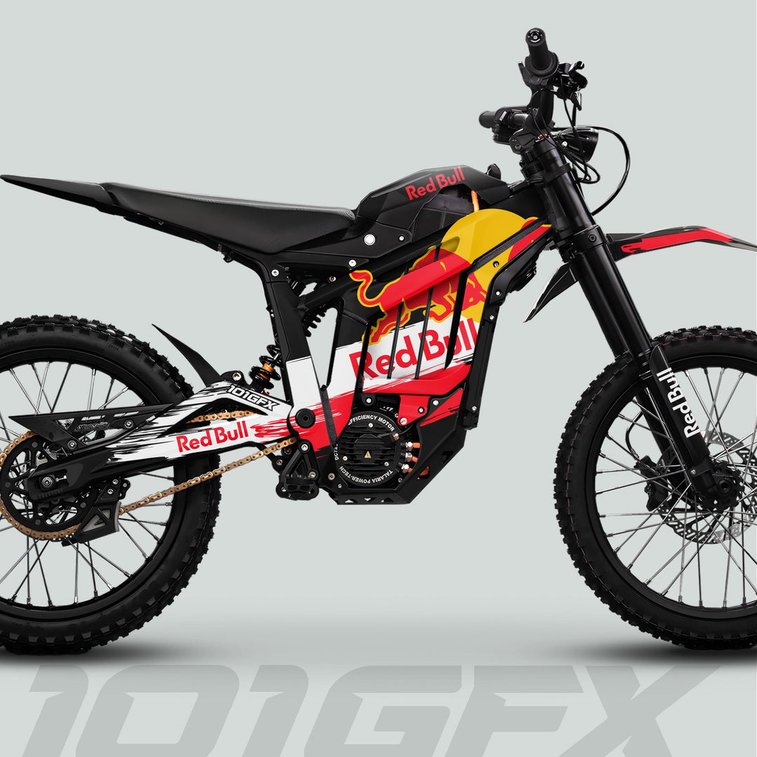 Talaria Sting MX5 PRO Graphics Kit RBULL RACE Black Decals on an electric off-road bike with Red Bull livery, knobby tires, and suspension.