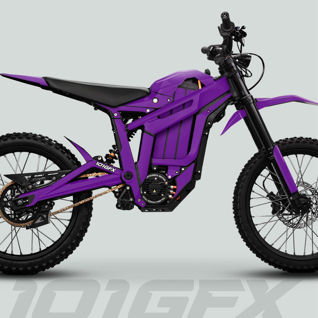 Talaria Sting MX5 PRO Graphics Kit SOLID COLOR Purple Decals on an electric dirt bike, showcasing a sleek, modern design with tubular frame and knobby tires.