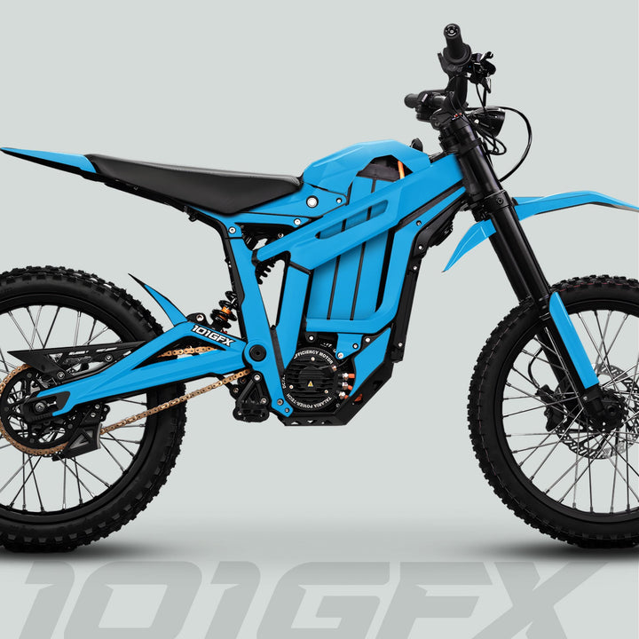 Side-profile of a modern electric dirt bike featuring Talaria Sting MX5 PRO Graphics Kit SOLID COLOR Cyan Decals, highlighting tubular frame, electric motor, and off-road tires.