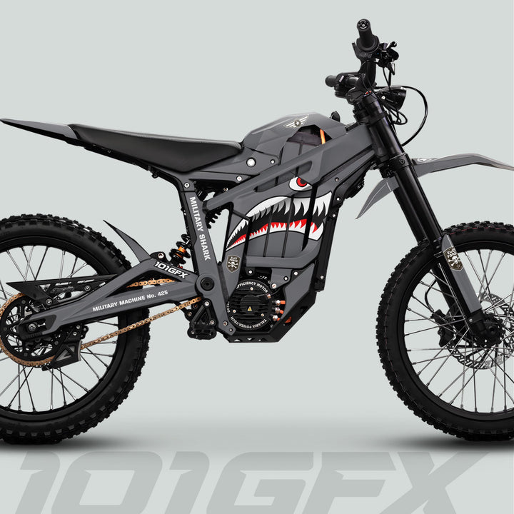 Talaria Sting MX5 PRO Graphics Kit MILITARY SHARK Grey Decals on an electric dirt bike with shark-mouth graphics, robust off-road tires, and motocross-style features.