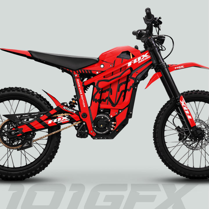 Talaria Sting MX5 PRO Graphics Kit on red-black electric dirt bike with FOX RACELINE decals, featuring durable, full-coverage design on tubular frame and knobby tires.