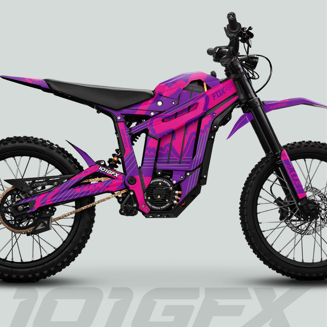 Talaria Sting MX5 PRO Graphics Kit FOX STRIPES on electric dirt bike, featuring durable, stylish purple-pink camo livery with FOX branding, designed for off-road enthusiasts.