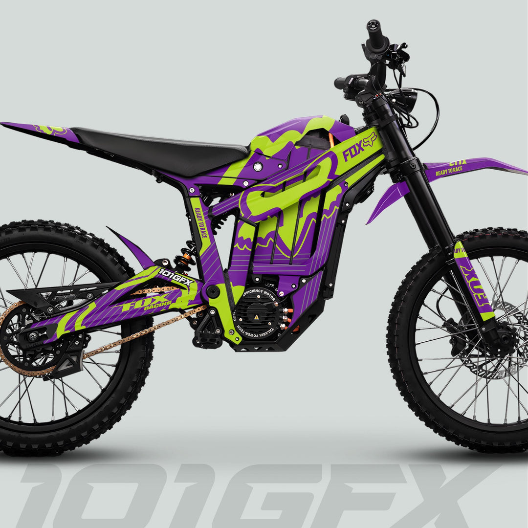 Talaria Sting MX5 PRO Graphics Kit FOX STRIPES, featuring a race-ready electric bike with purple and lime-green Fox Racing livery, showcasing style and durability.