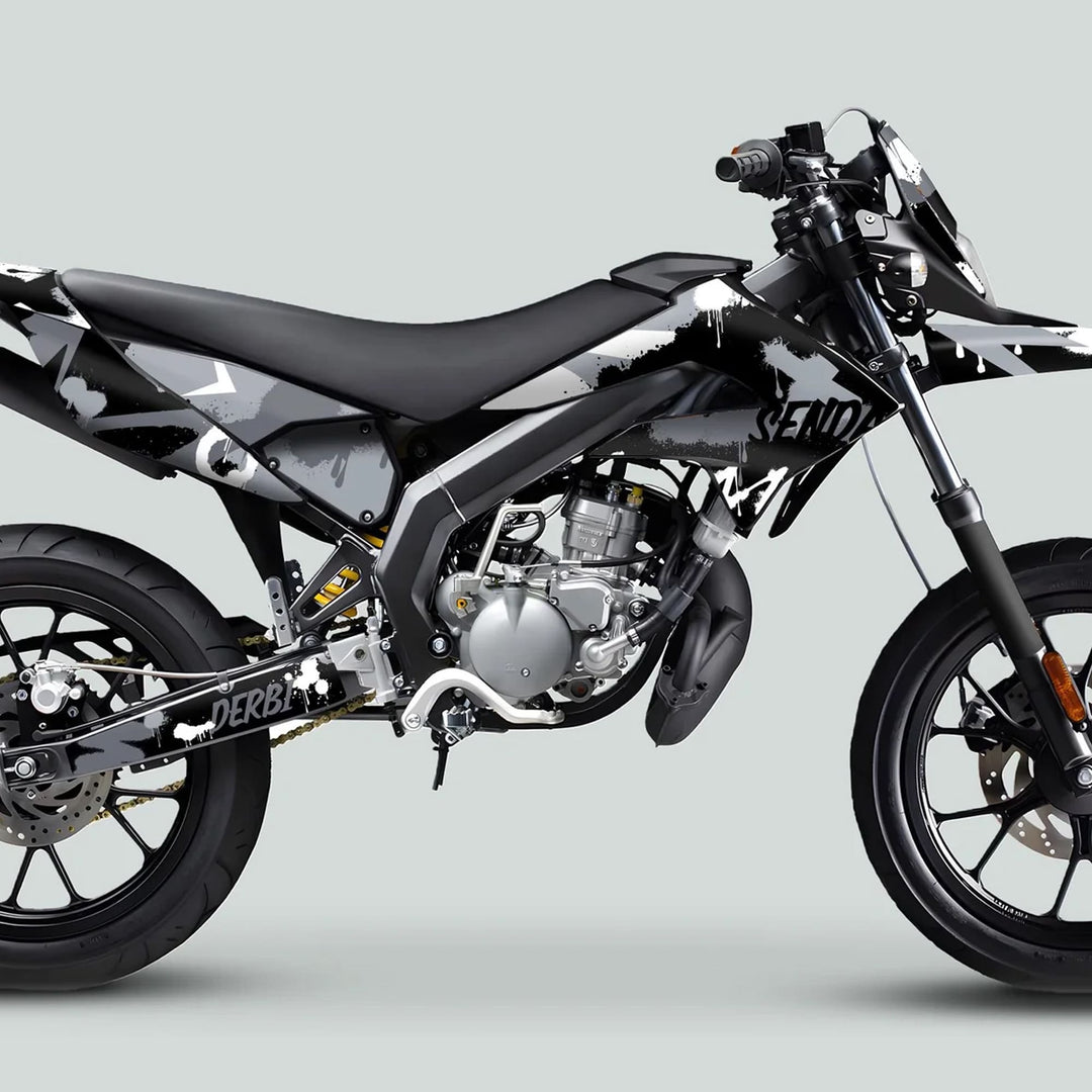 Derbi Senda motorcycle with Graphics Kit X-Treme 2011-2017 SPLASH GREY WHITE, showcasing graffiti-inspired design on body panels, frame, and swingarm with Derbi logo.