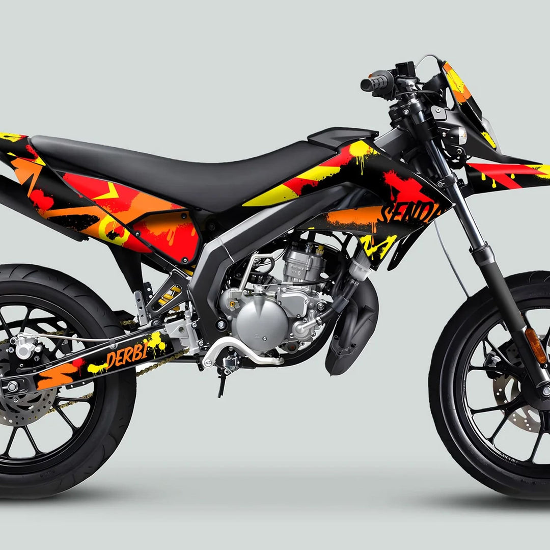 Derbi Senda Graphics Kit X-Treme 2011-2017 SPLASH RED ORANGE on a motorcycle, showcasing graffiti-style graphics on frame, swingarm, and seat.