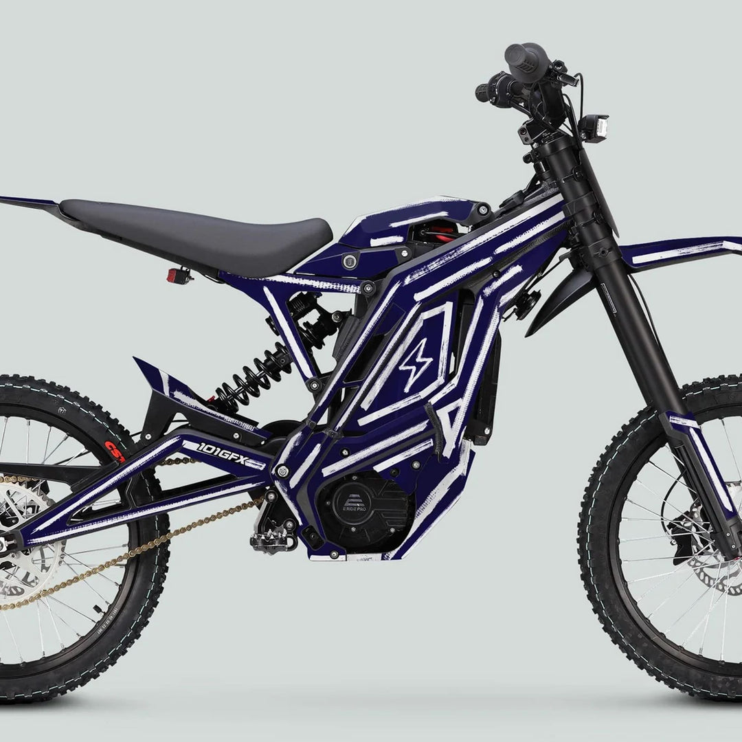 E Ride Pro SS Graphics Kit BRUSH Navy White on an electric off-road bike, showcasing integrated battery, motor, suspension forks, knobby tires, and chain drive.