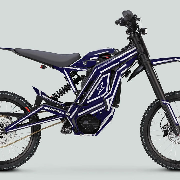 E Ride Pro SS Graphics Kit BRUSH Navy White on an electric off-road bike, showcasing integrated battery, motor, suspension forks, knobby tires, and chain drive.