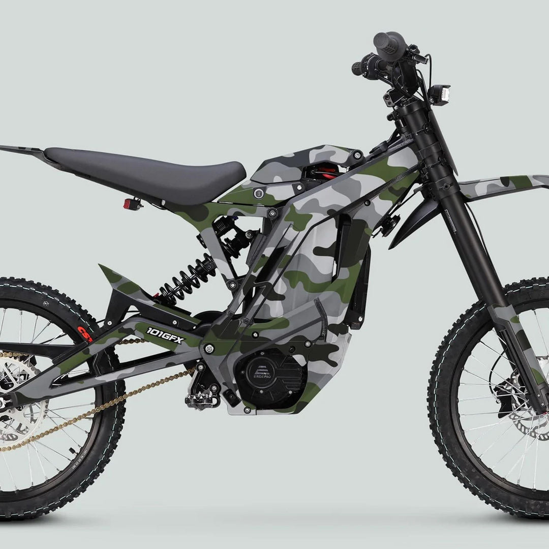 E Ride Pro SS Graphics Kit CAMOUFLAGE OLISH on a camo-patterned electric off-road bike, highlighting its front suspension, rear shock, and durable, stylish decals.