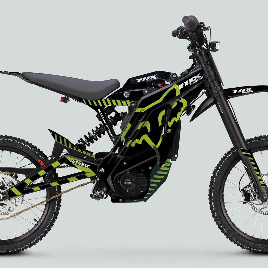E Ride Pro SS Graphics Kit FOX Race Line Black Green on an electric off-road motorbike, showcasing bold design and easy installation for enhanced style and protection.