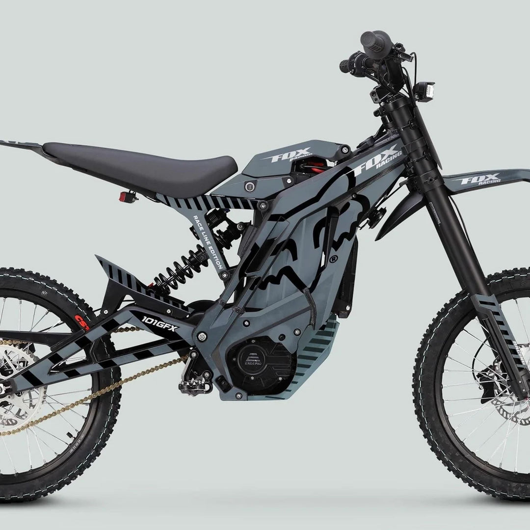 Side profile of E Ride Pro SS Graphics Kit FOX Race Line Grey Black on an electric dirt bike featuring Fox Racing branding and durable decals.