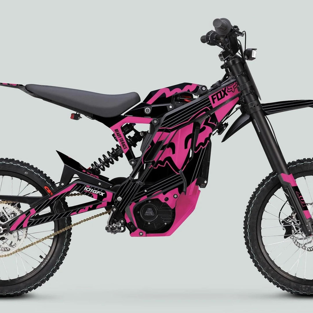 E Ride Pro SS Graphics Kit FOX R Stripes Black Pink on a motocross-style electric dirt bike, showcasing its precision fit and vibrant design for off-road adventures.