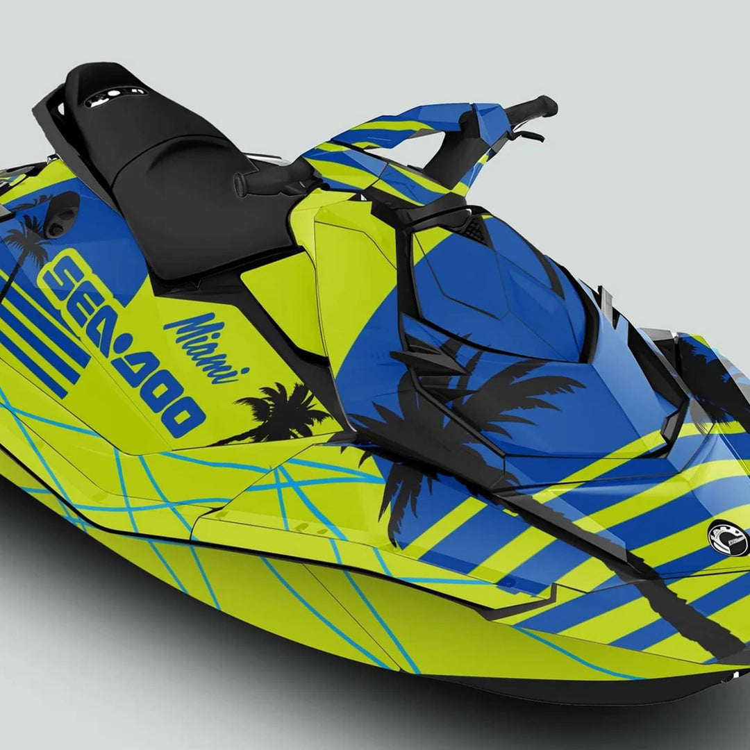 Sea Doo Spark Graphics kit MIAMI GREEN BLUE featuring bright blue-and-neon-yellow wrap with palm-tree silhouettes and bold stripes, enhancing your watercraft's style and durability.