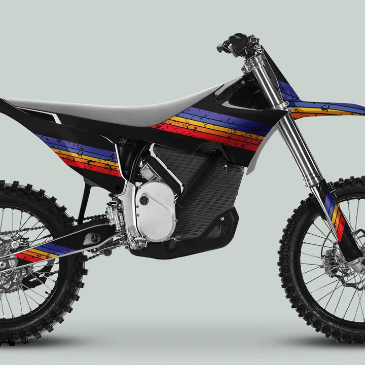 Stark Varg Graphics Kit RETRO MULTI Decals Stickers on a dirt bike, showcasing retro-style stripes and durable design for enhanced vehicle aesthetics.