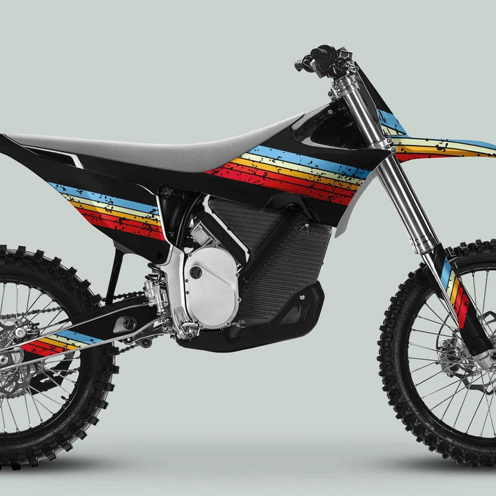 Side view of a motocross bike featuring Stark Varg Graphics Kit RETRO ORIGINAL Decals, showcasing vintage racing stripes and modern electric components.