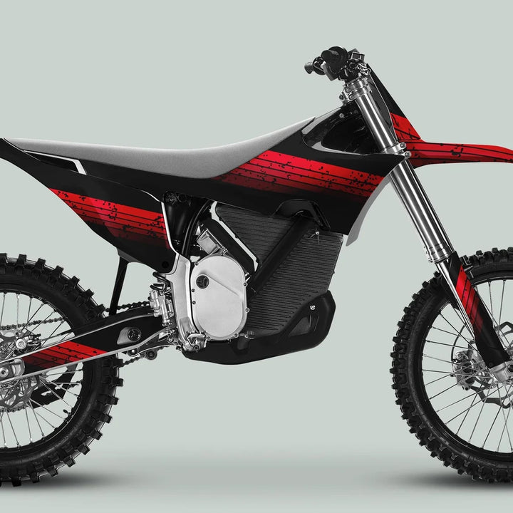 Side-profile of an off-road electric motorcycle with Stark Varg Graphics Kit RETRO RED Decals Stickers, showcasing vibrant retro design on black and red color scheme.