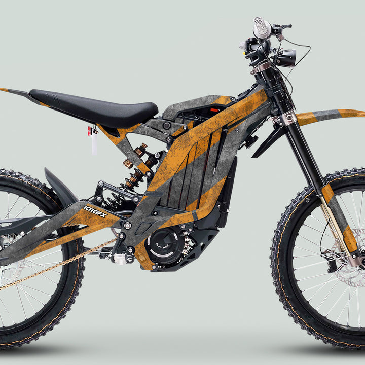 Side-profile of an e-dirt bike featuring the Surron Light Bee X Graphics Kit CONCRETE LINES with a durable, sophisticated design on its angular frame and minimalist seat.